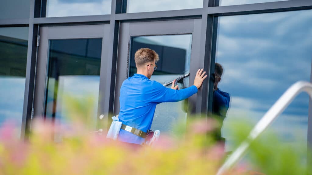 Siding cleaning to protect from any damages using a gentle soft washing method on a residential home.